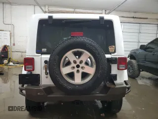 2017 Jeep Wrangler Unlimited Rubicon Recon with VIN 1C4HJWFG9HL543266, listed as a Copart auction lot 87771705 with 50,223 mi miles and Salvage title. Bid and sale history available at DreamBid. Image 6.