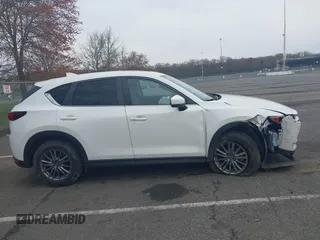 2017 Mazda CX-5 Touring with VIN JM3KFACL5H0189296, listed as a IAAI auction lot 42042328 with 60,208 mi miles and . Bid and sale history available at carsss.com. Image 13.