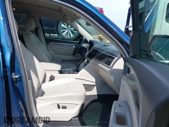 2018 Volkswagen Atlas SEL z VIN 1V2MR2CA4JC512804, wystawiony jako IAAI lot #42528402 z przebiegiem 59 226 mil mil oraz . Historia ofert i sprzedaży dostępna na DreamBid. Obrazek 5.