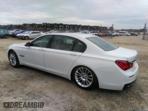 2015 BMW 7 Series 750Li with VIN WBAYE8C50FD781160, listed as a IAAI auction lot 41061232 with 154,496 mi miles. Bid and sale history available at carsss.com. Image 3.