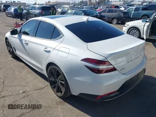 2023 Genesis G70 2.0T with VIN KMTG34TAXPU112861, listed as a IAAI auction lot 41320749 with 33,824 mi miles. Bid and sale history available at carsss.com. Image 3.