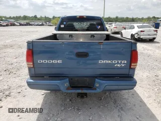 2003 Dodge Dakota с VIN 1D7GL72Z63S140501, выставлен на аукционе Copart как лот 52825824 с пробегом 188 913 миль миль и Списание • Salvage title. История ставок и продаж доступна на DreamBid. Изображение 6.