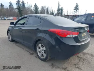 2011 Hyundai Elantra Ltd with VIN KMHDH4AE8BU084832, listed as a IAAI auction lot 41455695 with 176,634 mi miles. Bid and sale history available at carsss.com. Image 3.