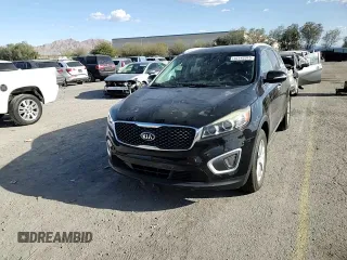 2017 Kia Sorento LX z VIN 5XYPG4A31HG240884, wystawiony jako Copart lot #52142315 z przebiegiem 88 556 mil mil oraz Szkoda całkowita • Salvage title. Historia ofert i sprzedaży dostępna na DreamBid. Obrazek 12.