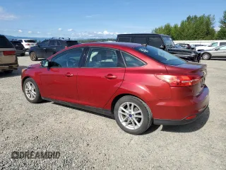 2015 Ford Focus SE with VIN 1FADP3F24FL386359, listed as a Copart auction lot 63519185 with 114,079 mi miles and Salvage title. Bid and sale history available at DreamBid. Image 2.