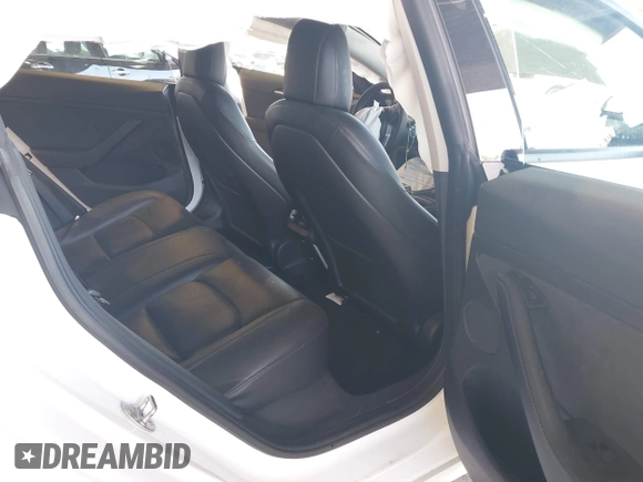 2022 Tesla Model 3 Long Range z VIN 5YJ3E1EB1NF192570, wystawiony jako IAAI lot #42230750 z przebiegiem 63 462 mil mil oraz . Historia ofert i sprzedaży dostępna na DreamBid. Obrazek 8.