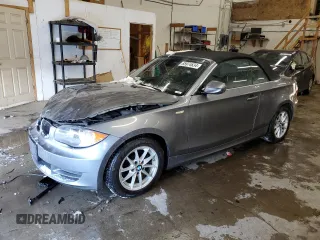 2011 BMW 1 Series 128i with VIN WBAUN1C59BVH83518, listed as a Copart auction lot 85974634 with 35,650 mi miles and Salvage Title. Bid and sale history available at carsss.com. Image 1.