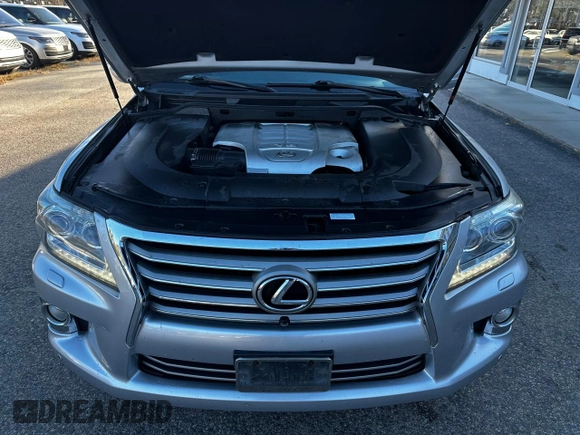 2013 Lexus LX 570 with VIN JTJHY7AXXD4091614, listed as a Copart auction lot 82096184 with 205,635 mi miles and Clean Title. Bid and sale history available at DreamBid. Image 7.