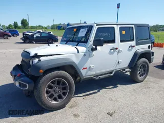 2013 Jeep Wrangler Unlimited Sport with VIN 1C4BJWDG4DL697208, listed as a IAAI auction lot 39507413 with 177,125 mi miles and . Bid and sale history available at DreamBid. Image 2.