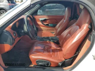 1999 Porsche Boxster z VIN WP0CA2984XU629987, wystawiony jako Copart lot #51366845 z przebiegiem Nie podano mil oraz Czysty tytuł • Clean title. Historia ofert i sprzedaży dostępna na DreamBid. Obrazek 7.