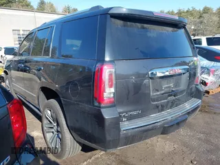 2020 GMC Yukon Denali with VIN 1GKS2CKJXLR204111, listed as a IAAI auction lot 41745764 with 76,364 mi miles. Bid and sale history available at carsss.com. Image 3.