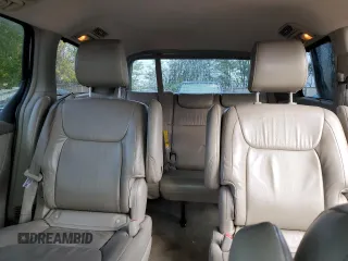 2010 Toyota Sienna XLE z VIN 5TDDK4CC3AS034036, wystawiony jako Copart lot #78494514 z przebiegiem 208 928 mil mil oraz Szkoda całkowita • Salvage title. Historia ofert i sprzedaży dostępna na DreamBid. Obrazek 10.