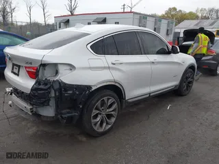 2018 BMW X4 xDrive28i with VIN 5UXXW3C57J0T82081, listed as a IAAI auction lot 41991254 with 100,654 mi miles. Bid and sale history available at carsss.com. Image 4.