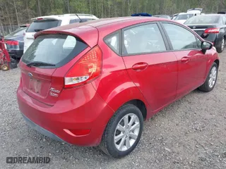 2011 Ford Fiesta SE with VIN 3FADP4EJ6BM128965, listed as a IAAI auction lot 41932743 with 123,057 mi miles. Bid and sale history available at carsss.com. Image 4.