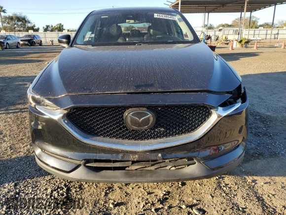 2018 Mazda CX-5 Grand Touring with VIN JM3KFBDMXJ0318474, listed as a Copart auction lot 46438545 with 58,702 mi miles and Salvage Title. Bid and sale history available at DreamBid. Image 5.