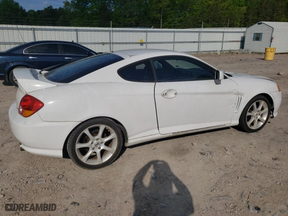2004 Hyundai Tiburon GT with VIN KMHHN65F84U149299, listed as a Copart auction lot 73946344 with 186,198 mi miles and Non Repairable. Bid and sale history available at carsss.com. Image 3.