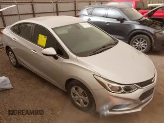 2017 Chevrolet Cruze LS z VIN 3G1BC5SM0HS521309, wystawiony jako IAAI lot #41791125 z przebiegiem 75 835 mil mil oraz . Historia ofert i sprzedaży dostępna na DreamBid. Obrazek 1.