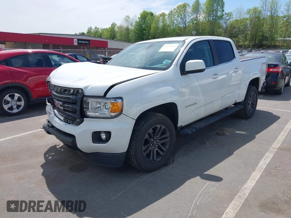 2019 GMC Canyon 4WD SLE z VIN 1GTG6CENXK1319647, wystawiony jako IAAI lot #42039568 z przebiegiem 56 371 mil mil oraz . Historia ofert i sprzedaży dostępna na DreamBid. Obrazek 18.