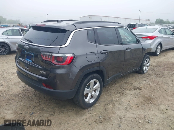 2019 Jeep Compass Latitude with VIN 3C4NJDBB8KT748588, listed as a IAAI auction lot 42224482 with 70,810 mi miles and . Bid and sale history available at DreamBid. Image 4.