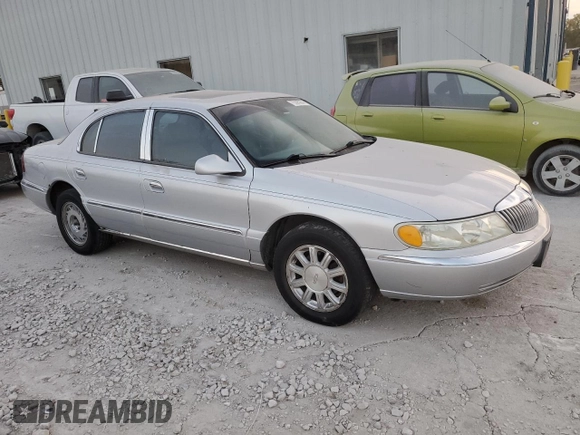 2002 Lincoln Continental with VIN 1LNHM97VX2Y672516, listed as a Copart auction lot 75595354 with 154,361 mi miles and Salvage Title. Bid and sale history available at carsss.com. Image 4.