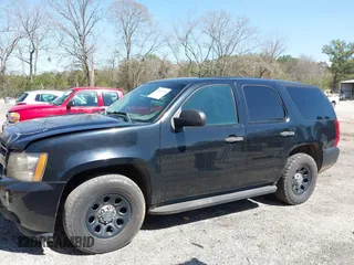 2007 Chevrolet Tahoe Police z VIN 1GNEC03097R417705, wystawiony jako IAAI lot #41882598 z przebiegiem 235 859 mil mil oraz . Historia ofert i sprzedaży dostępna na DreamBid. Obrazek 14.