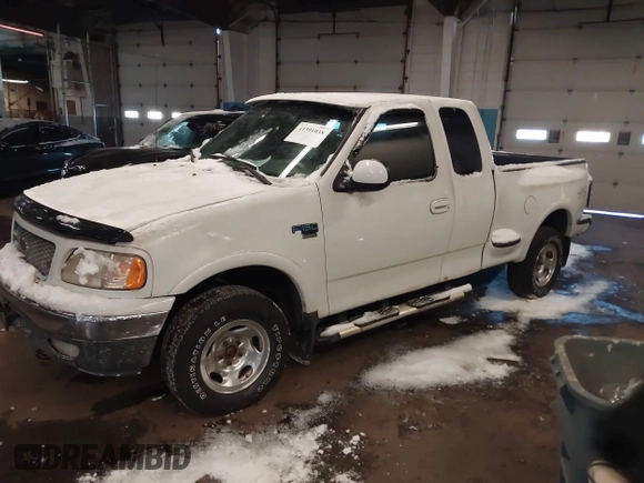 2000 Ford F-150 z VIN 2FTRX08W6YCA09298, wystawiony jako IAAI lot #41391038 z przebiegiem 179 738 mil mil oraz . Historia ofert i sprzedaży dostępna na DreamBid. Obrazek 2.