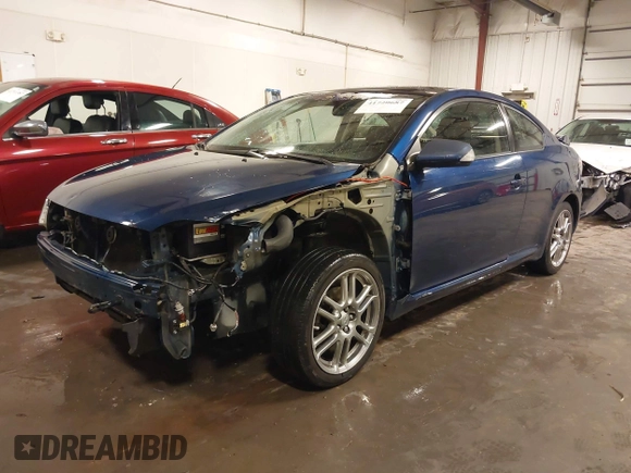 2009 Scion tC with VIN JTKDE167990297921, listed as a IAAI auction lot 41720687 with 159,960 mi miles. Bid and sale history available at carsss.com. Image 19.