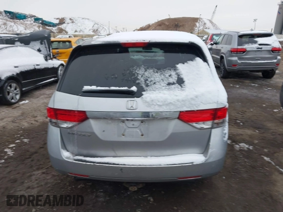 2014 Honda Odyssey LX with VIN 5FNRL5H22EB080346, listed as a IAAI auction lot 41282783 with 101,000 mi miles and . Bid and sale history available at carsss.com. Image 16.