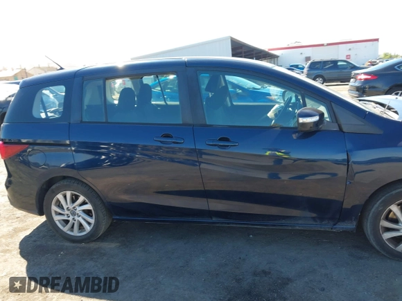 2014 Mazda 5 Sport with VIN JM1CW2BLXE0175975, listed as a IAAI auction lot 40278614 with 102,430 mi miles and . Bid and sale history available at DreamBid. Image 13.