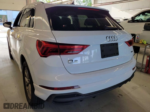 2023 Audi Q3 S line Premium with VIN WA1DECF37P1064251, listed as a IAAI auction lot 42791686 with 56,584 mi miles and . Bid and sale history available at DreamBid. Image 21.