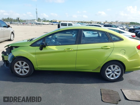 2011 Ford Fiesta SE z VIN 3FADP4BJ3BM181711, wystawiony jako IAAI lot #42492104 z przebiegiem 102 667 mil mil oraz . Historia ofert i sprzedaży dostępna na DreamBid. Obrazek 15.
