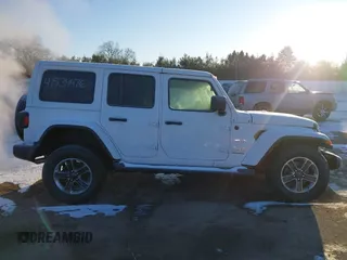 2021 Jeep Wrangler Unlimited Sahara with VIN 1C4HJXEG2MW827385, listed as a IAAI auction lot 41534476 with 29,489 mi miles and . Bid and sale history available at DreamBid. Image 13.