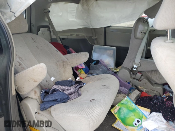 2014 Toyota Sienna LE AAS with VIN 5TDKK3DC5ES423802, listed as a Copart auction lot 69075824 with Not Provided miles and Salvage Title. Bid and sale history available at DreamBid. Image 12.