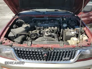 1999 Mitsubishi Montero LS z VIN JA4LS31H1XP034327, wystawiony jako Copart lot #52573485 z przebiegiem 286 753 mil mil oraz Szkoda całkowita • Salvage title. Historia ofert i sprzedaży dostępna na DreamBid. Obrazek 11.