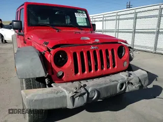2015 Jeep Wrangler Unlimited Willys Wheeler with VIN 1C4BJWDG8FL574014, listed as a Copart auction lot 51921255 with 54,134 mi miles and Salvage Title. Bid and sale history available at DreamBid. Image 12.