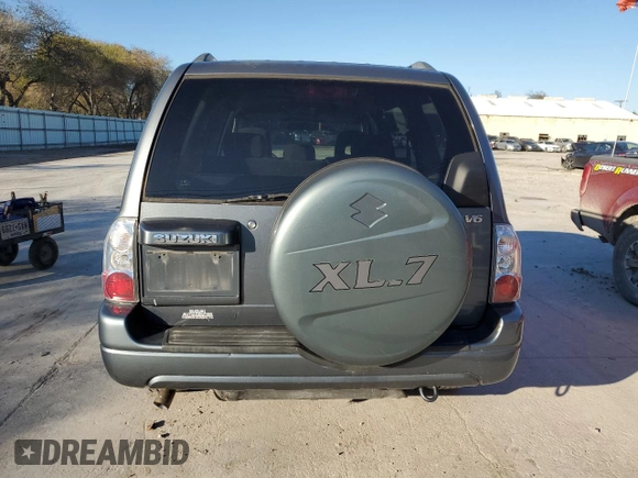 2005 Suzuki XL7 LX z VIN JS3TY92V554107839, wystawiony jako Copart lot #88328455 z przebiegiem 122 912 mil mil oraz Szkoda całkowita • Salvage title. Historia ofert i sprzedaży dostępna na DreamBid. Obrazek 6.