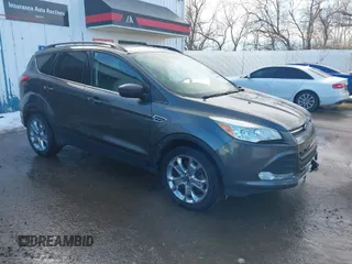 2015 Ford Escape SE with VIN 1FMCU9G98FUA70885, listed as a IAAI auction lot 41608240 with 54,802 mi miles. Bid and sale history available at carsss.com. Image 1.