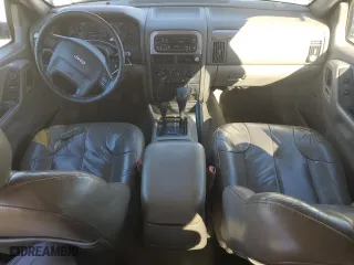 2001 Jeep Grand Cherokee Laredo with VIN 1J4GW48N41C701347, listed as a Copart auction lot 78946764 with 180,232 mi miles and Salvage Title. Bid and sale history available at carsss.com. Image 8.