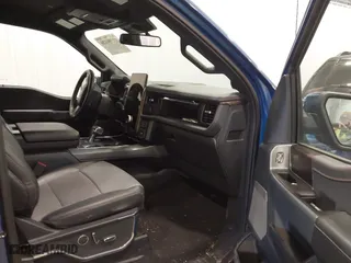 2022 Ford F-150 Lightning Pro with VIN 1FTVW1EL7NWG15923, listed as a IAAI auction lot 41396120 with 25,322 mi miles. Bid and sale history available at carsss.com. Image 5.