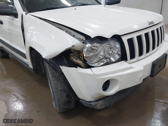 2006 Jeep Grand Cherokee Laredo with VIN 1J8GR48K06C163877, listed as a IAAI auction lot 41971240 with 250,544 mi miles. Bid and sale history available at carsss.com. Image 6.