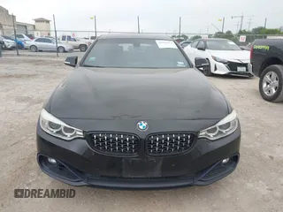 2016 BMW 4 Series 428i with VIN WBA4A9C51GG506512, listed as a IAAI auction lot 41940754 with 144,999 mi miles and . Bid and sale history available at DreamBid. Image 12.