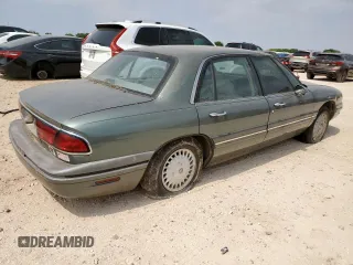 1999 Buick LeSabre Limited z VIN 1G4HR52K5XH469192, wystawiony jako Copart lot #57516205 z przebiegiem 102 413 mil mil oraz Czysty tytuł • Clean title. Historia ofert i sprzedaży dostępna na DreamBid. Obrazek 3.