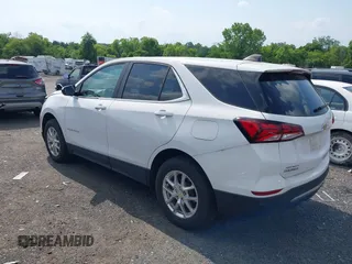 2022 Chevrolet Equinox LT z VIN 3GNAXUEV9NL174839, wystawiony jako IAAI lot #42470518 z przebiegiem 18 709 mil mil oraz . Historia ofert i sprzedaży dostępna na DreamBid. Obrazek 3.