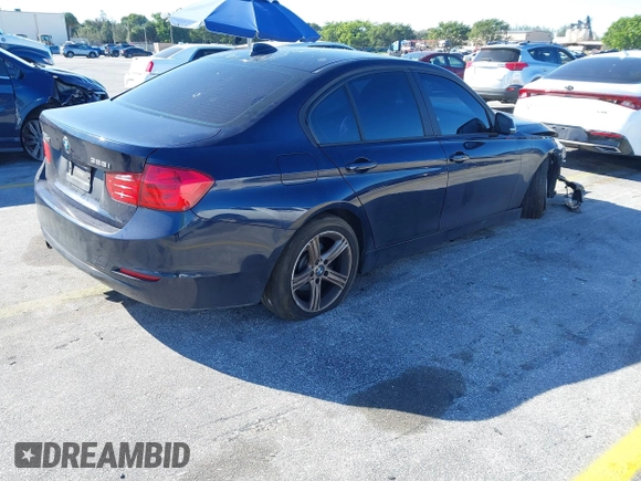 2015 BMW 3 Series 328i with VIN WBA3A5G55FNS91189, listed as a IAAI auction lot 41296279 with 115,120 mi miles. Bid and sale history available at carsss.com. Image 4.