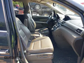 2011 Honda Odyssey Touring with VIN 5FNRL5H97BB073708, listed as a IAAI auction lot 42409164 with 141,986 mi miles and . Bid and sale history available at DreamBid. Image 5.