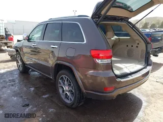2020 Jeep Grand Cherokee Overland with VIN 1C4RJECG8LC323824, listed as a IAAI auction lot 41757922 with 64,792 mi miles. Bid and sale history available at carsss.com. Image 3.