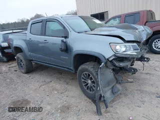 2018 Chevrolet Colorado 4WD ZR2 with VIN 1GCPTEE12J1297871, listed as a IAAI auction lot 41816842 with 101,872 mi miles. Bid and sale history available at carsss.com. Image 1.