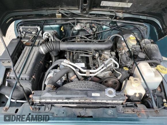 2000 Jeep Wrangler Sahara with VIN 1J4FA59S1YP747919, listed as a Copart auction lot 72278044 with 157,360 mi miles and Salvage Title. Bid and sale history available at carsss.com. Image 11.