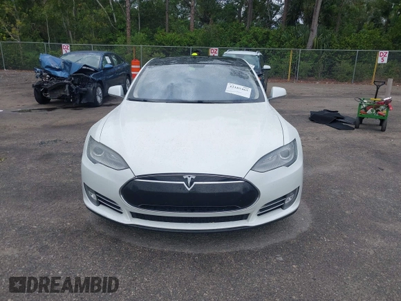 2013 Tesla Model S Performance with VIN 5YJSA1DP9DFP04076, listed as a IAAI auction lot 42185465 with 179,640 mi miles and . Bid and sale history available at DreamBid. Image 6.