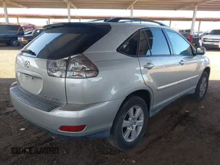 2007 Lexus RX 350 with VIN 2T2HK31U07C032913, listed as a IAAI auction lot 42009181 with 139,928 mi miles. Bid and sale history available at carsss.com. Image 4.